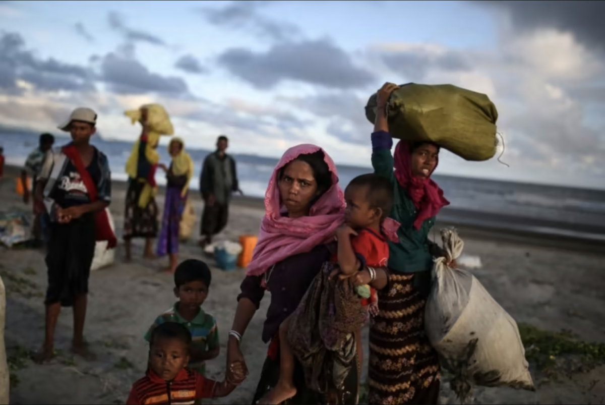 Rohingya Muslims fleeing violence in Rakhine make their way toward a temporary camp near Cox's Bazar, Bangladesh, in September 2017. (Getty Images)