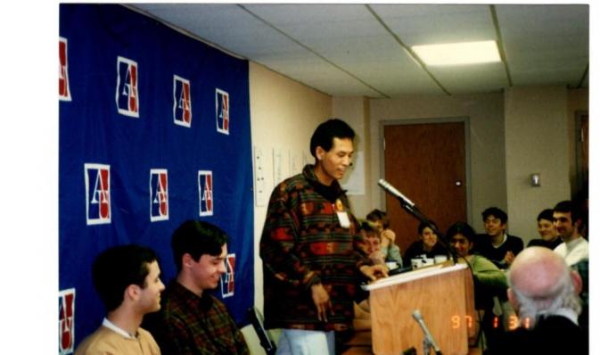 Zarni giving the opening speech at the first ever free Burma coalition meeting at American University, April 1997